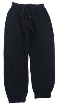 Černé vzorované cuff kalhoty Tu
